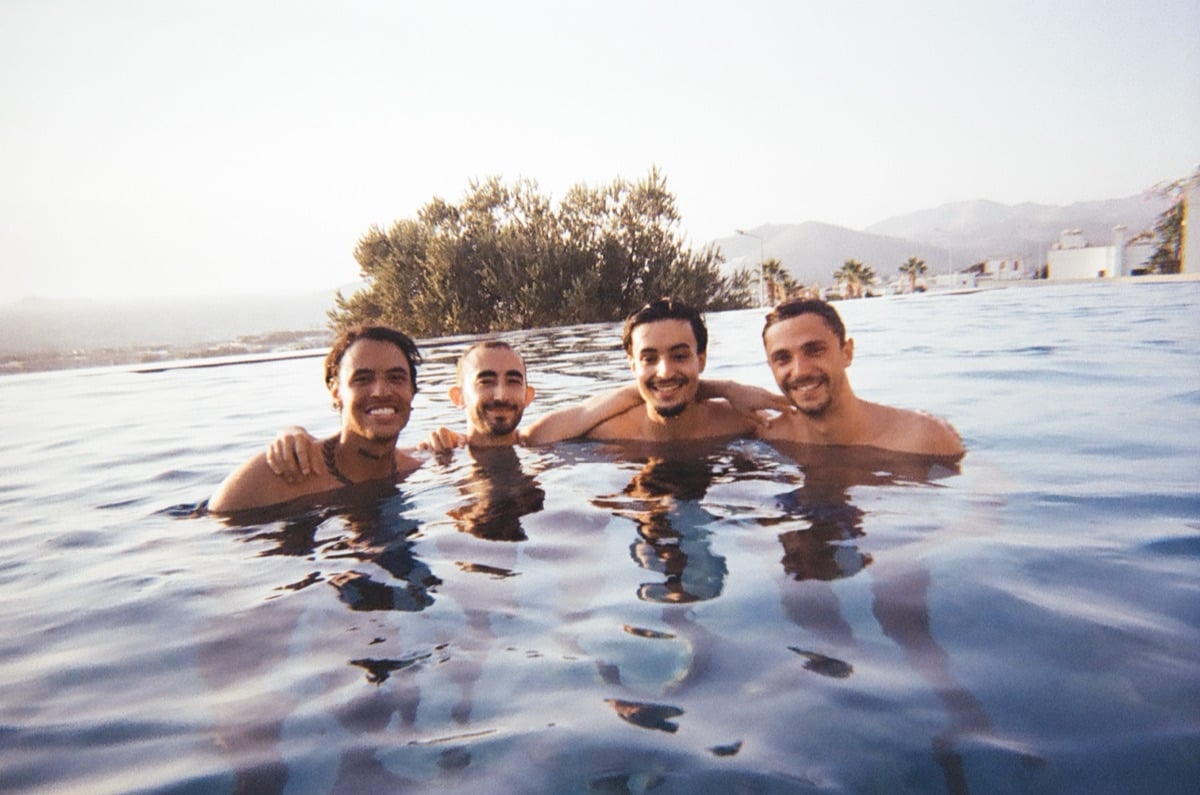Teammates in an infinity pool